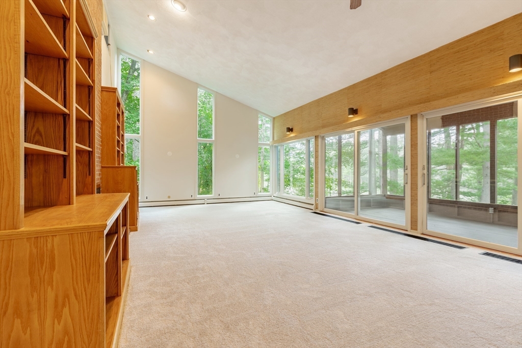 738 Lowell Road Groton, MA 01450 - Photo 7 of 30 a view of an empty room with a window