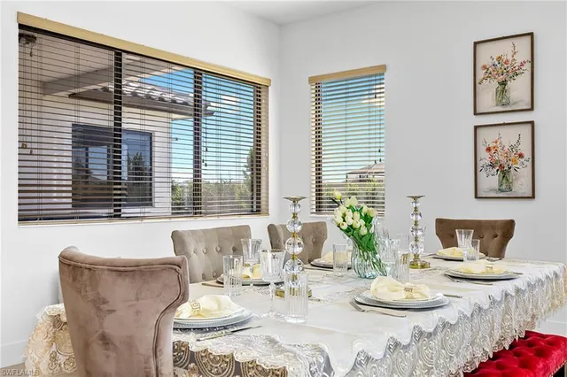 a bathroom with a sink a large mirror and a shower
