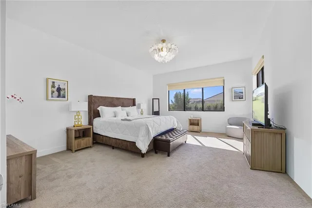 a view of a livingroom with workspace and a couch