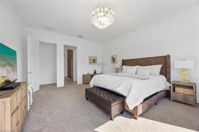 a bathroom with a sink vanity and toilet