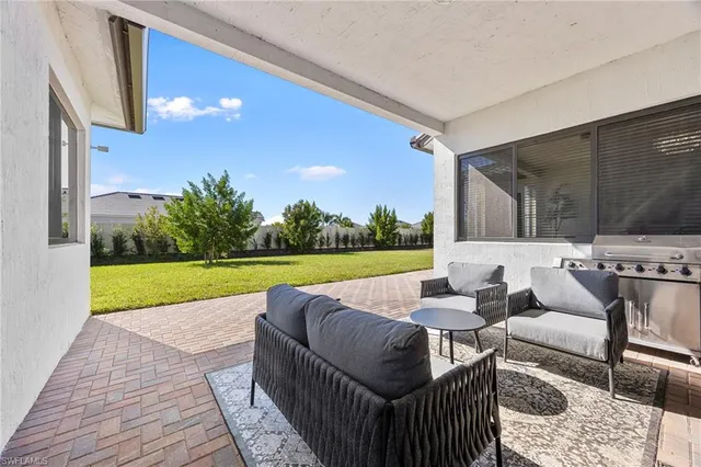 a bedroom with a bed and a desk