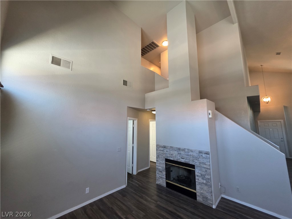 2275 Ramsgate Drive Henderson, NV 89074 - Photo 23 of 84 Dramatic vaulted ceilings crown this spacious living area with a contemporary fireplace and rich wood flooring.