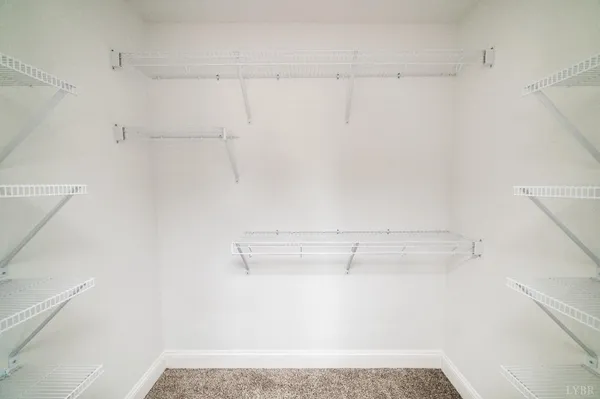 a view of a room with racks on the wall