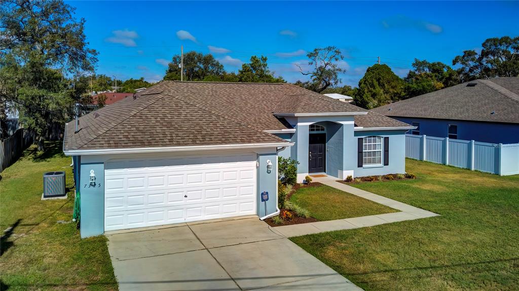 7325 Millstone Street Spring Hill, FL 34606 - Photo 1 of 46 Front View