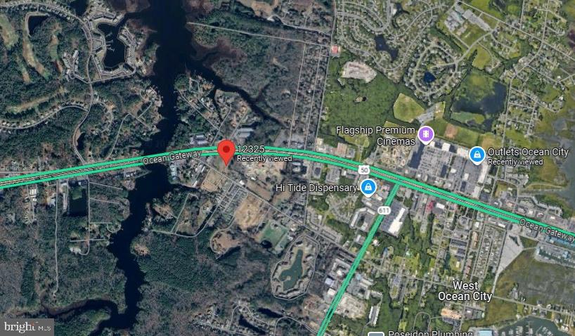 12325 Old Bridge Road Ocean City, MD 21842 - Photo 1 of 1 a view of outdoor space with a street sign