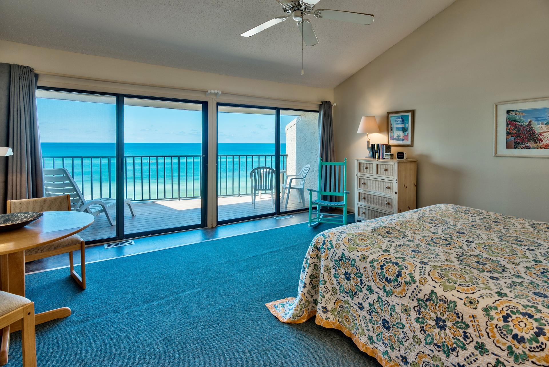 214 Blue Mountain Road, Unit 122 Santa Rosa Beach, FL 32459 - Photo 17 of 32 a bedroom with a bed and a table in it