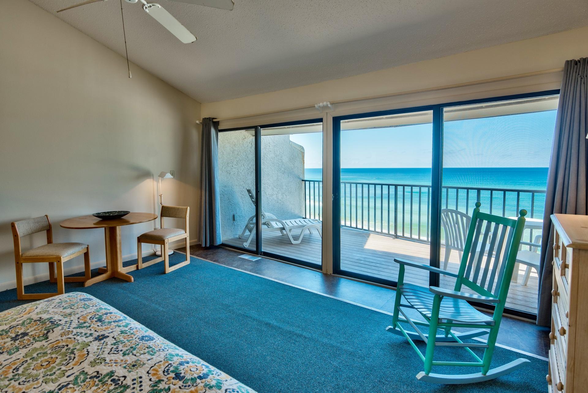 214 Blue Mountain Road, Unit 122 Santa Rosa Beach, FL 32459 - Photo 18 of 32 a view of a livingroom with furniture and a floor to ceiling window