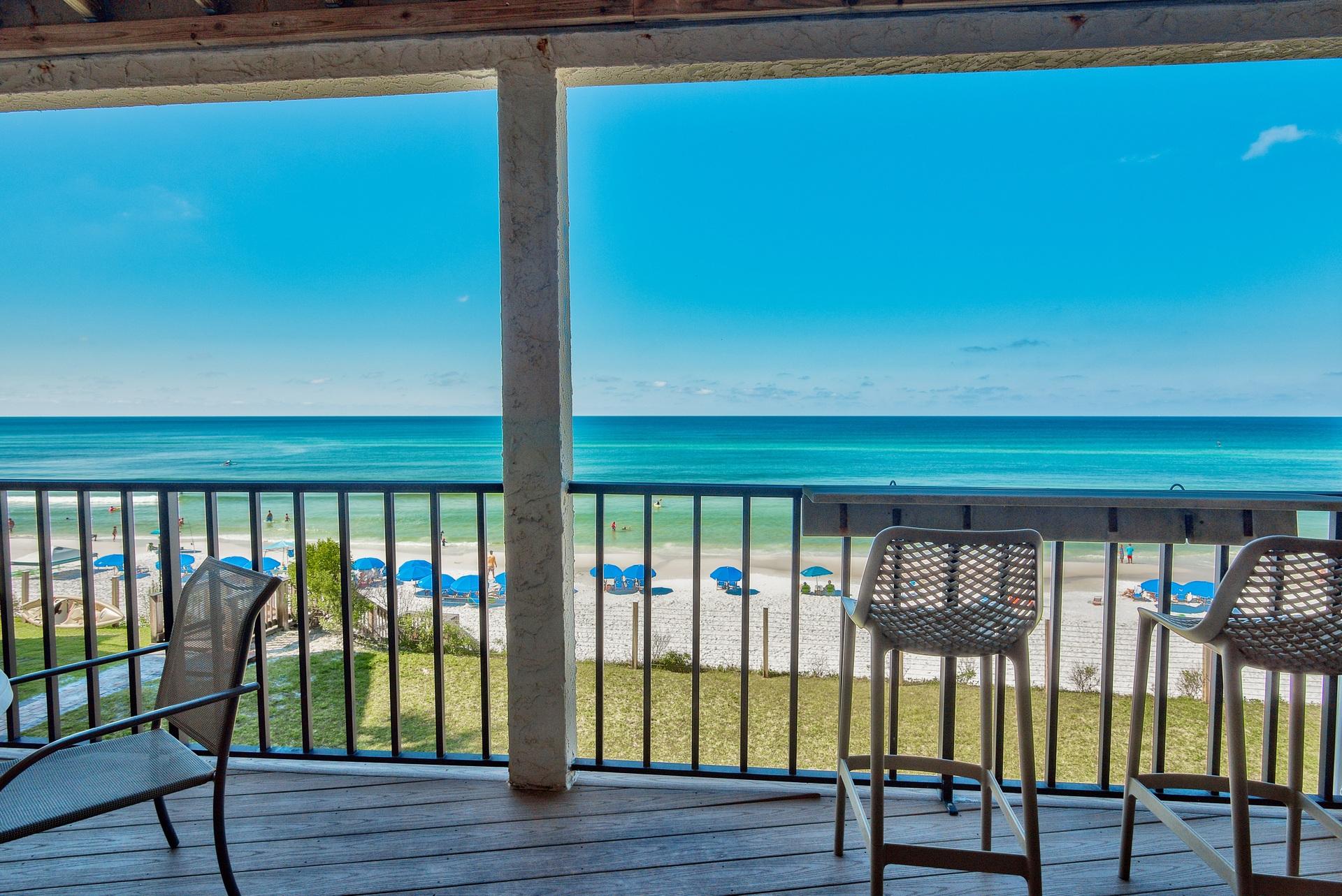214 Blue Mountain Road, Unit 122 Santa Rosa Beach, FL 32459 - Photo 6 of 32 a view of a porch with a floor to ceiling window and wooden floor