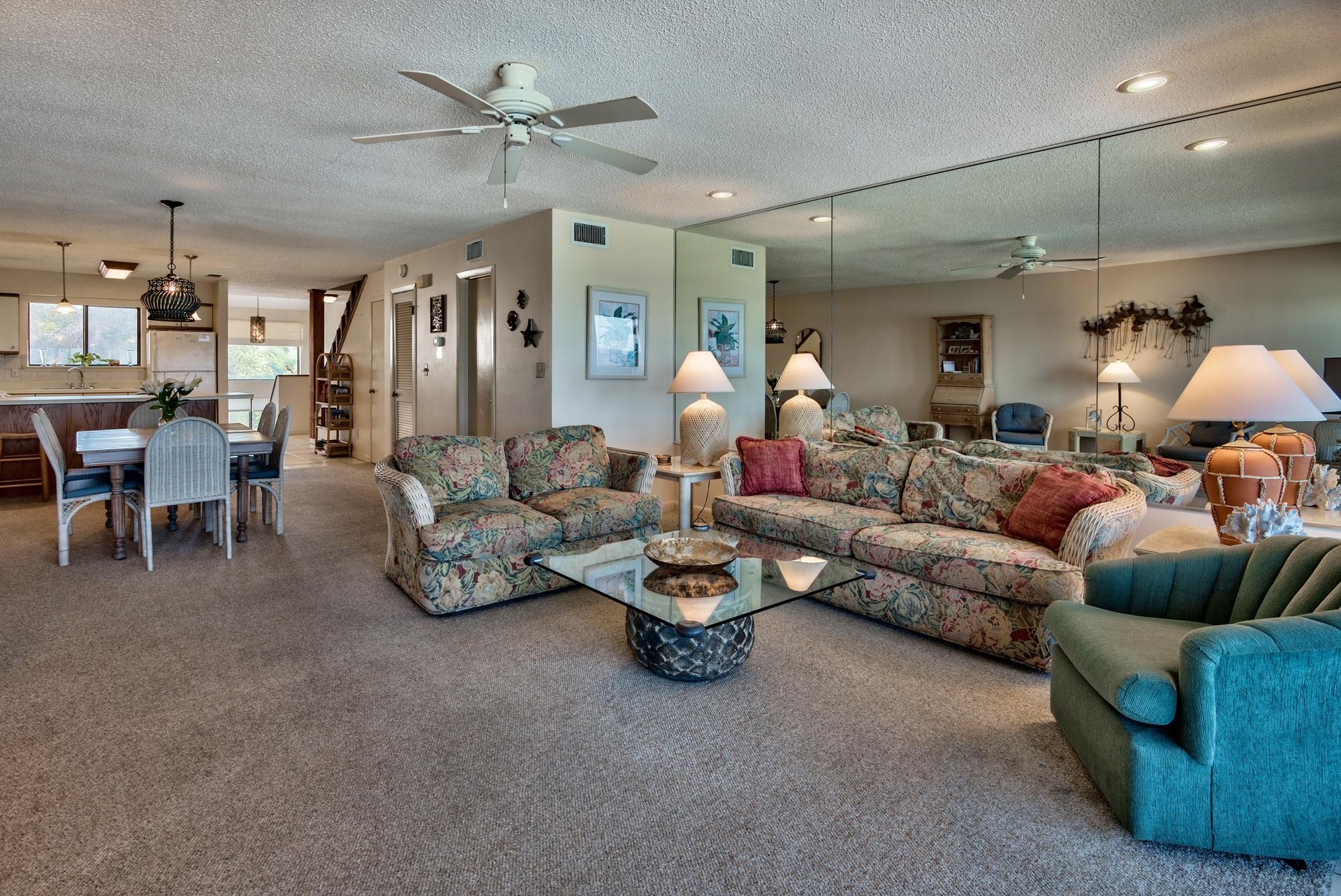 214 Blue Mountain Road, Unit 122 Santa Rosa Beach, FL 32459 - Photo 10 of 32 a living room with furniture and a chandelier