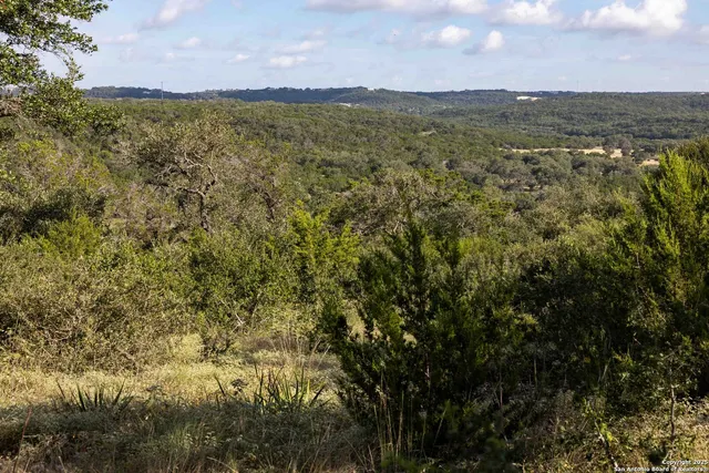 a view of a city with an outdoor space