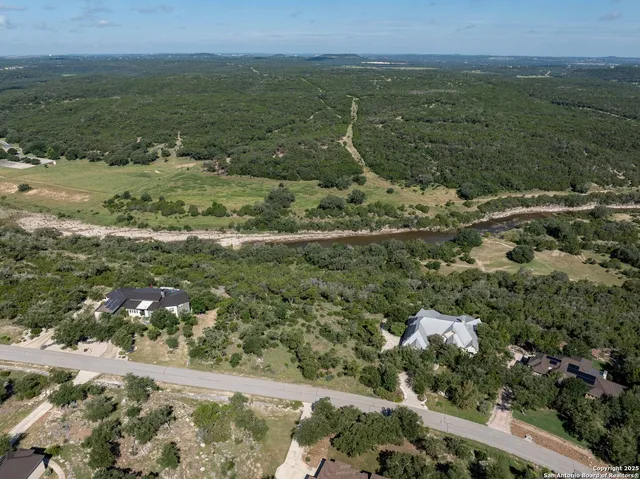 a view of a lake with a city