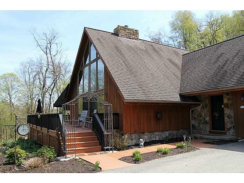 115 Chubbic Road Canonsburg, PA 15317 - Photo 2 of 25 Exterior Front. LOTS OF PARKING AREA ON THE CEMENT DRIVEWAY