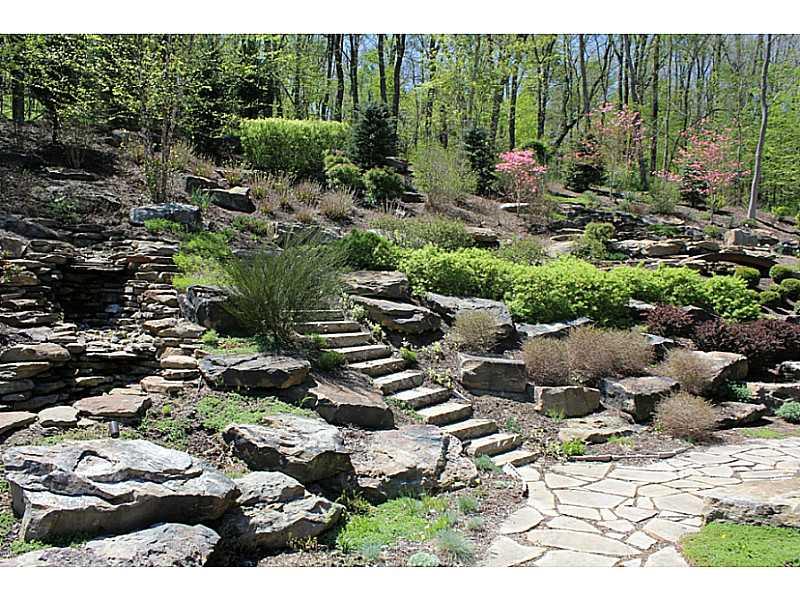 115 Chubbic Road Canonsburg, PA 15317 - Photo 20 of 25 Patio/Deck. over 400 ton of rocks brought in to provide lovely landscaping