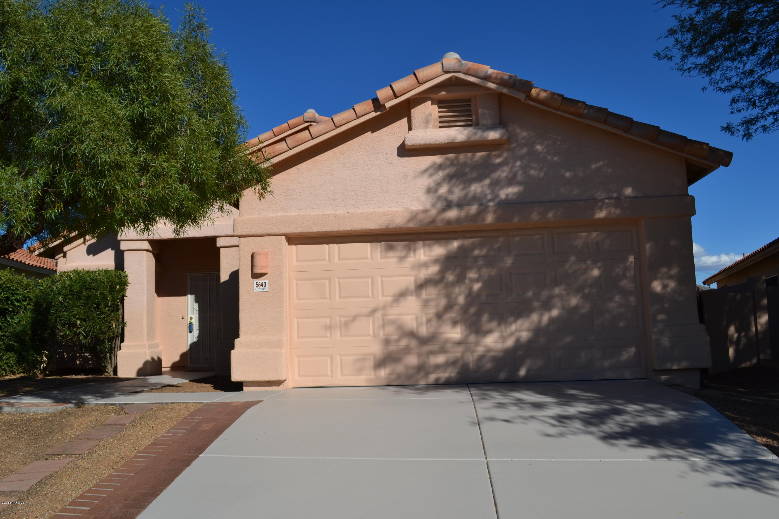 5640 North Cherokee Ridge Road Tucson, AZ 85750 - Photo 1 of 39 a view of a house with a backyard
