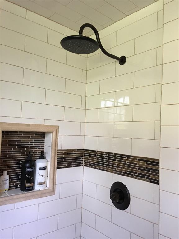 2330 Knight Road Denison, TX 75020 - Photo 11 of 14 a bathroom with a shower