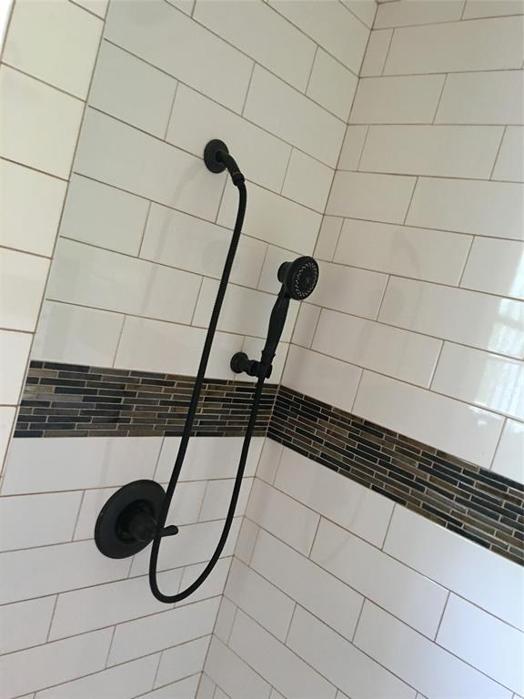 2330 Knight Road Denison, TX 75020 - Photo 12 of 14 a bathroom with a shower