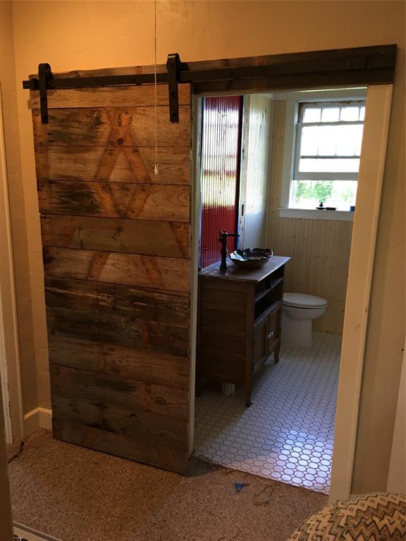 2330 Knight Road Denison, TX 75020 - Photo 10 of 14 a view of a bathroom