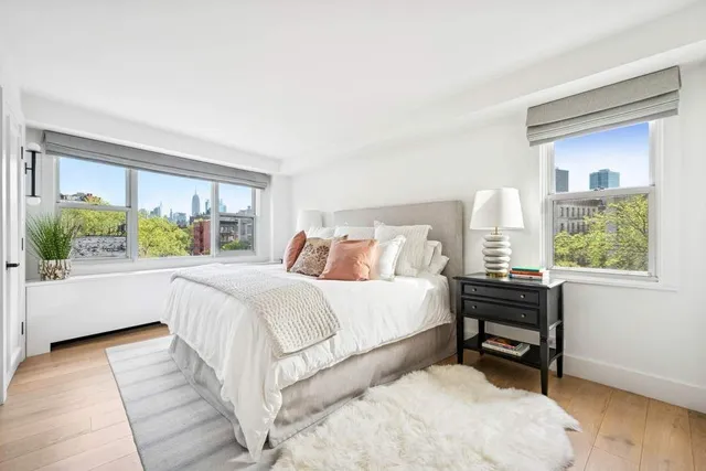 a kitchen with a counter space cabinets and appliances