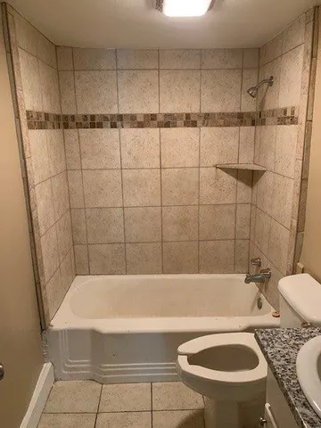 a bathroom with a sink and a toilet