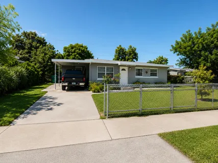 a house view with a garden space