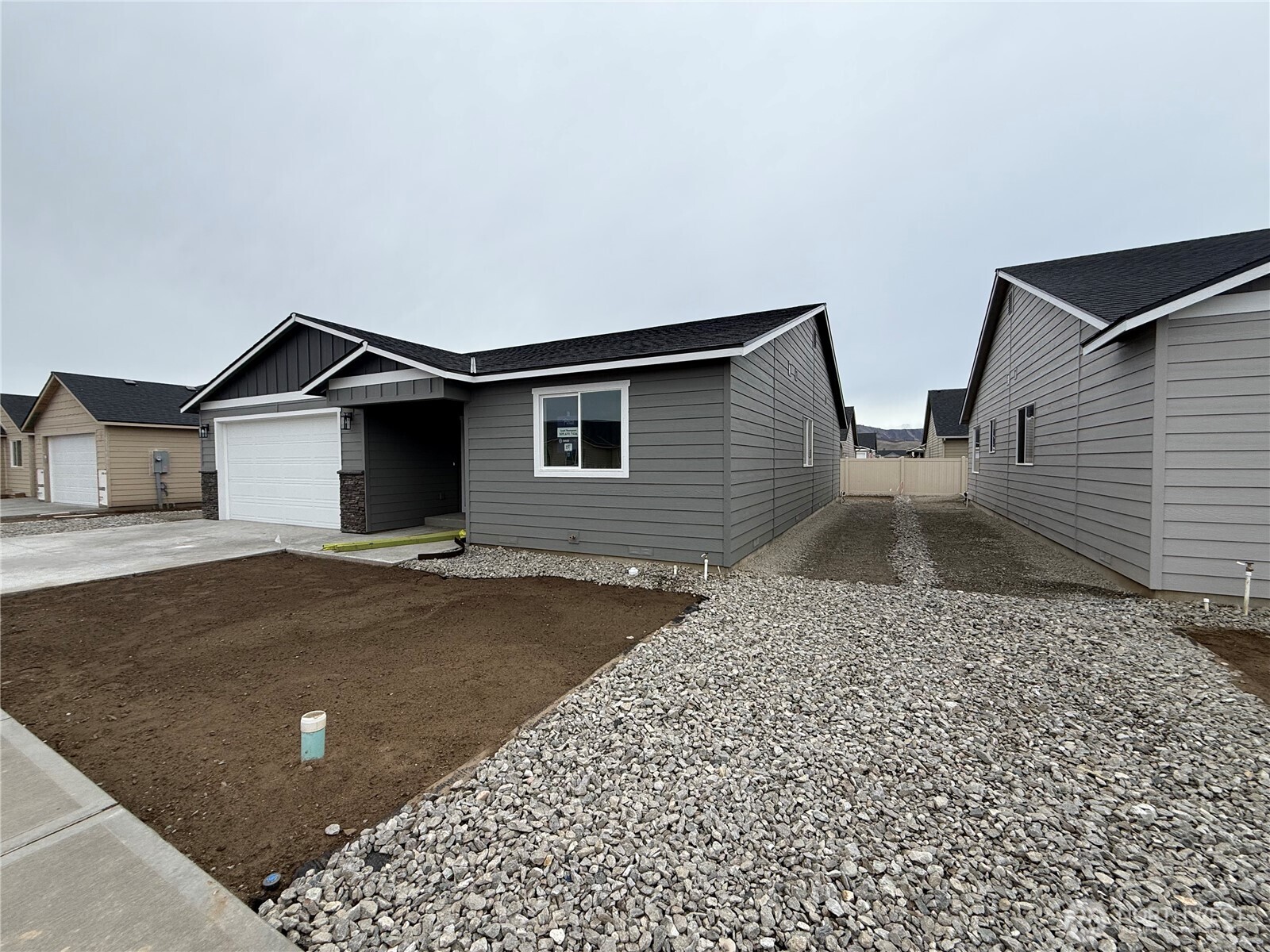 104 Salmon Drive Wenatchee, WA 98801 - Photo 2 of 35 a house view with a backyard space