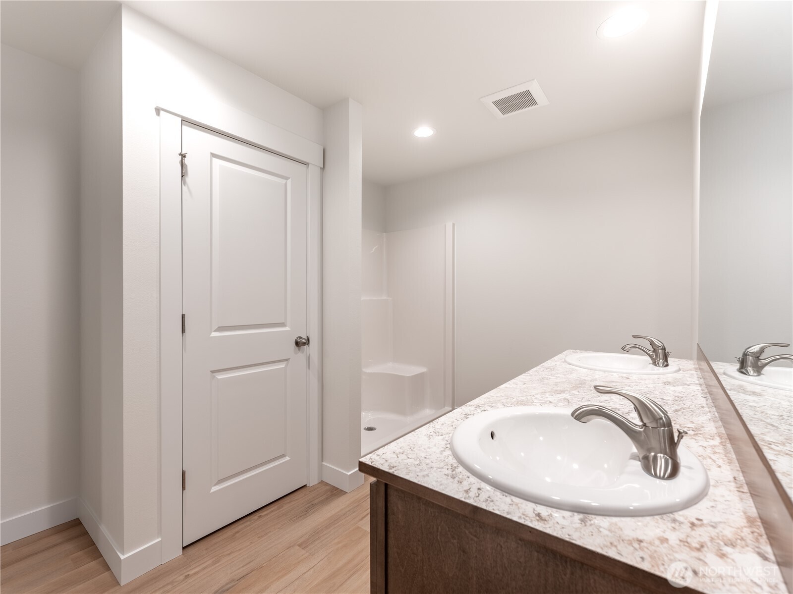 104 Salmon Drive Wenatchee, WA 98801 - Photo 22 of 35 a bathroom with a sink and a mirror
