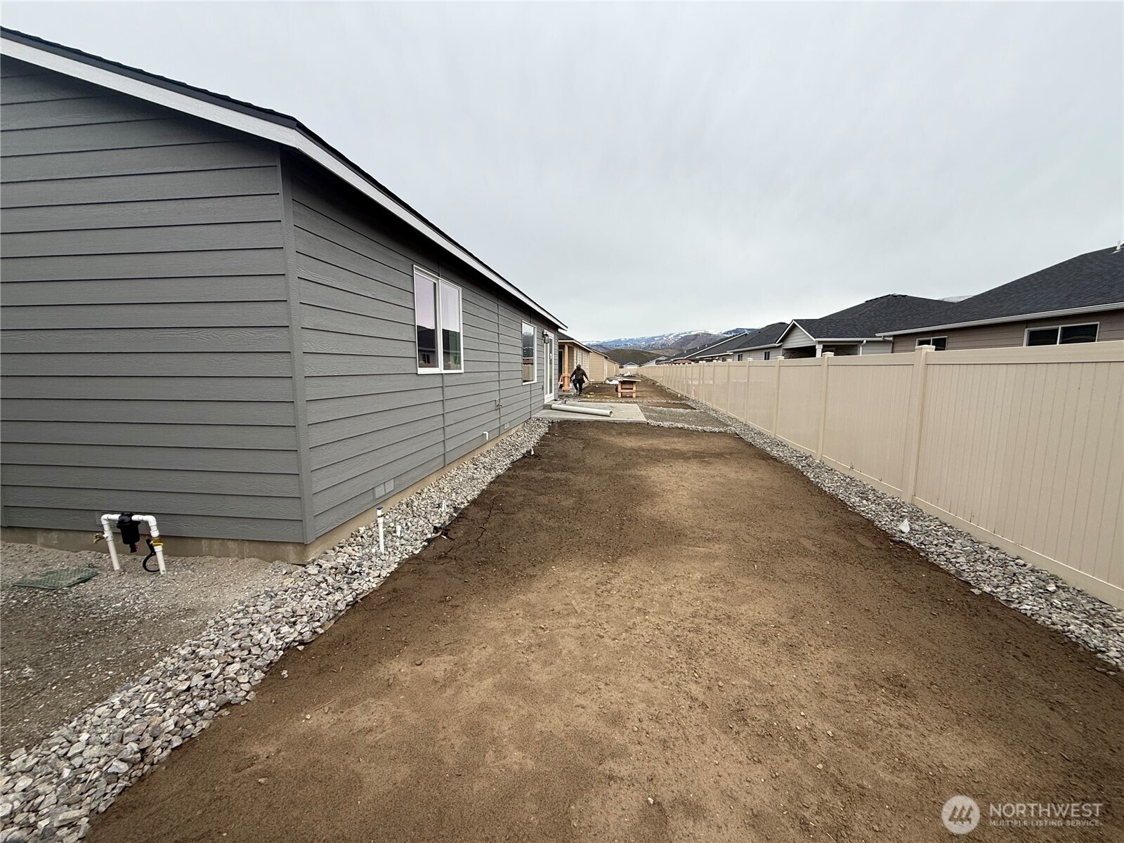 104 Salmon Drive Wenatchee, WA 98801 - Photo 34 of 35 a front view of a house with a yard