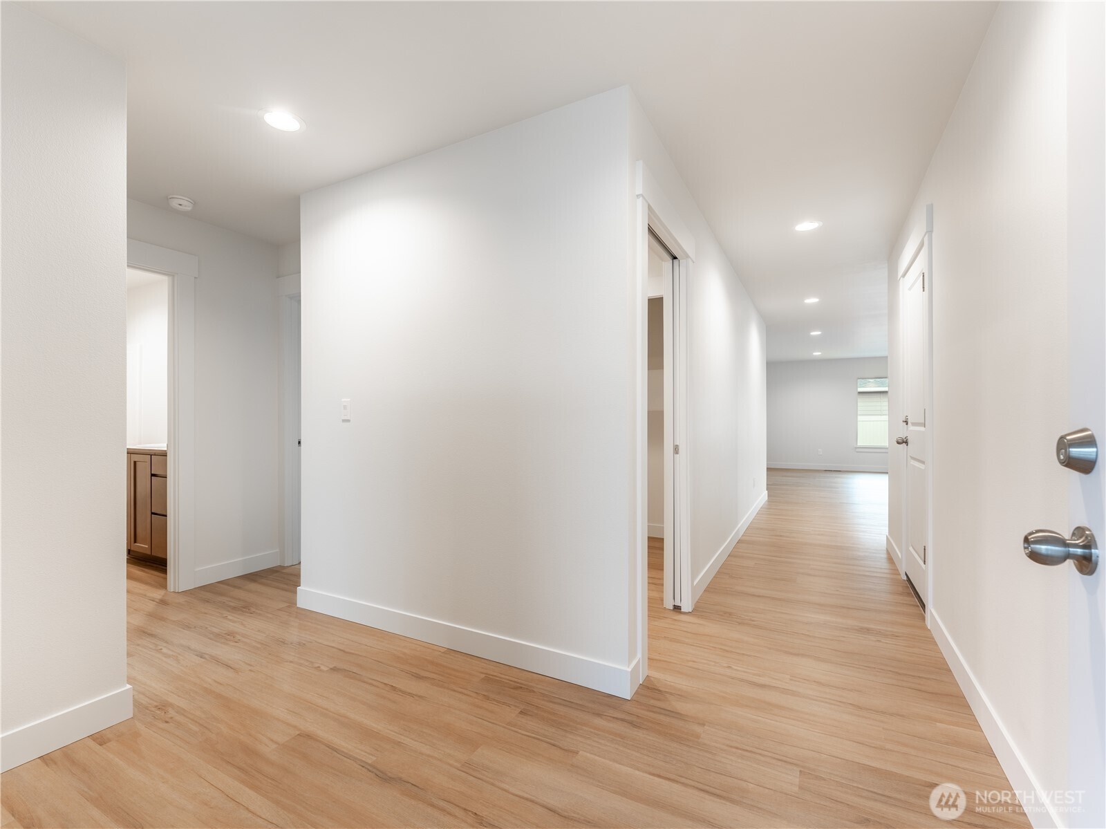 104 Salmon Drive Wenatchee, WA 98801 - Photo 4 of 35 a view of a hallway with wooden floor