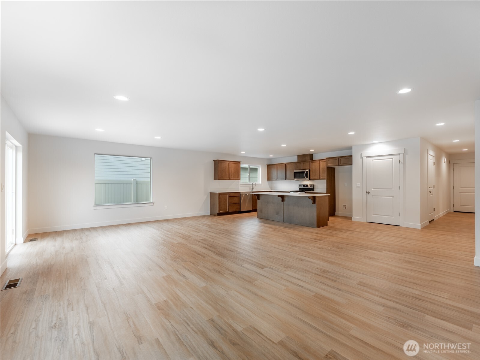 104 Salmon Drive Wenatchee, WA 98801 - Photo 7 of 35 a view of kitchen and kitchen with furniture wooden floor and window