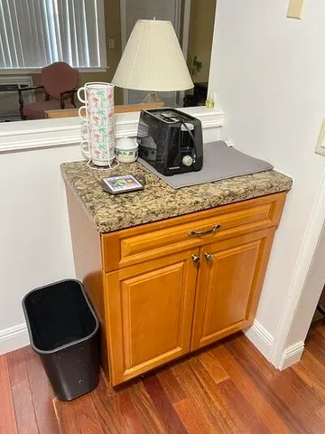a kitchen with sink and window