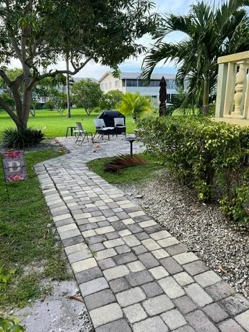 a view of a backyard with a garden