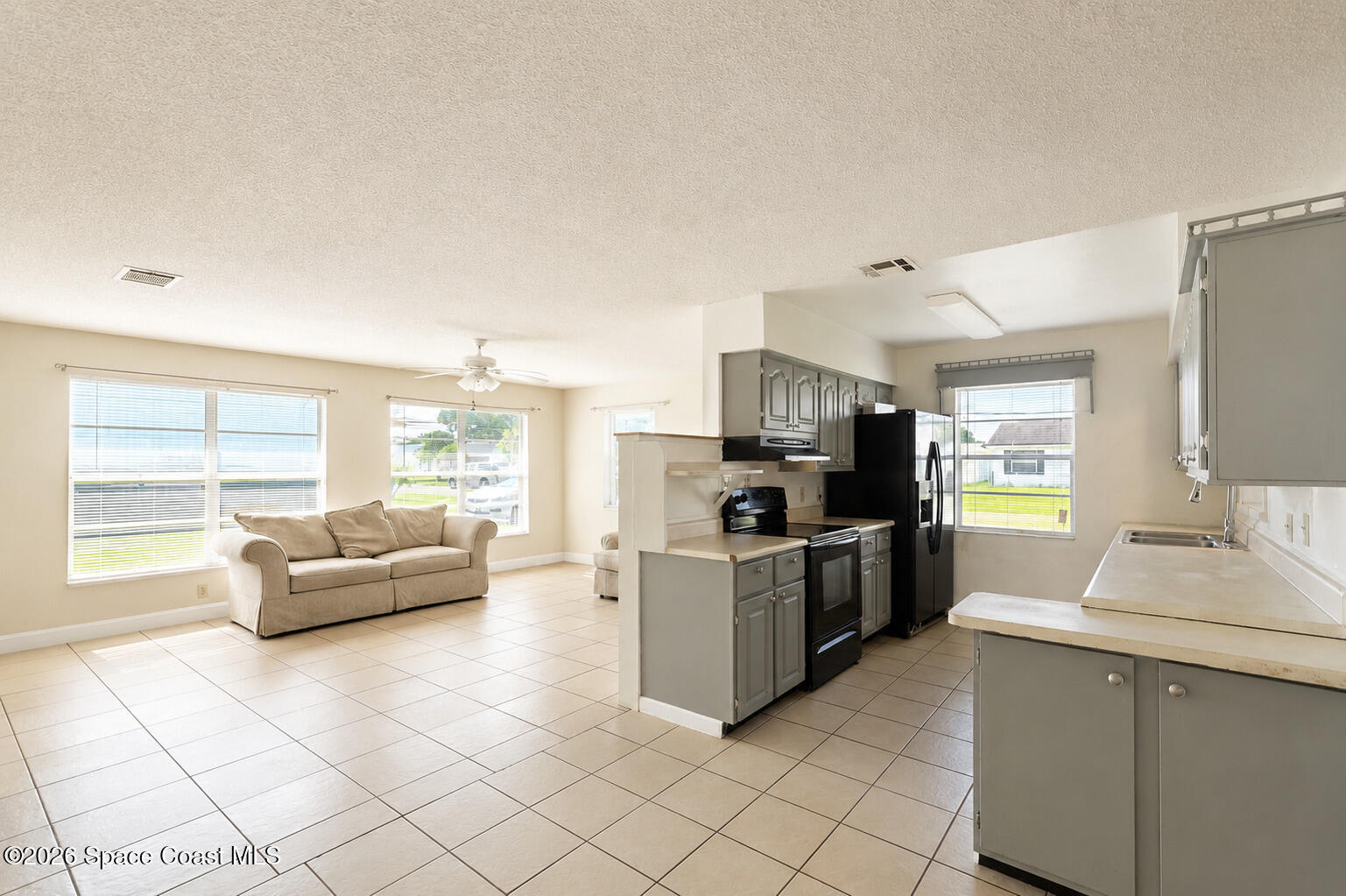 2882 Pembroke Road Melbourne, FL 32935 - Photo 5 of 26 6-Family Room Kitchen