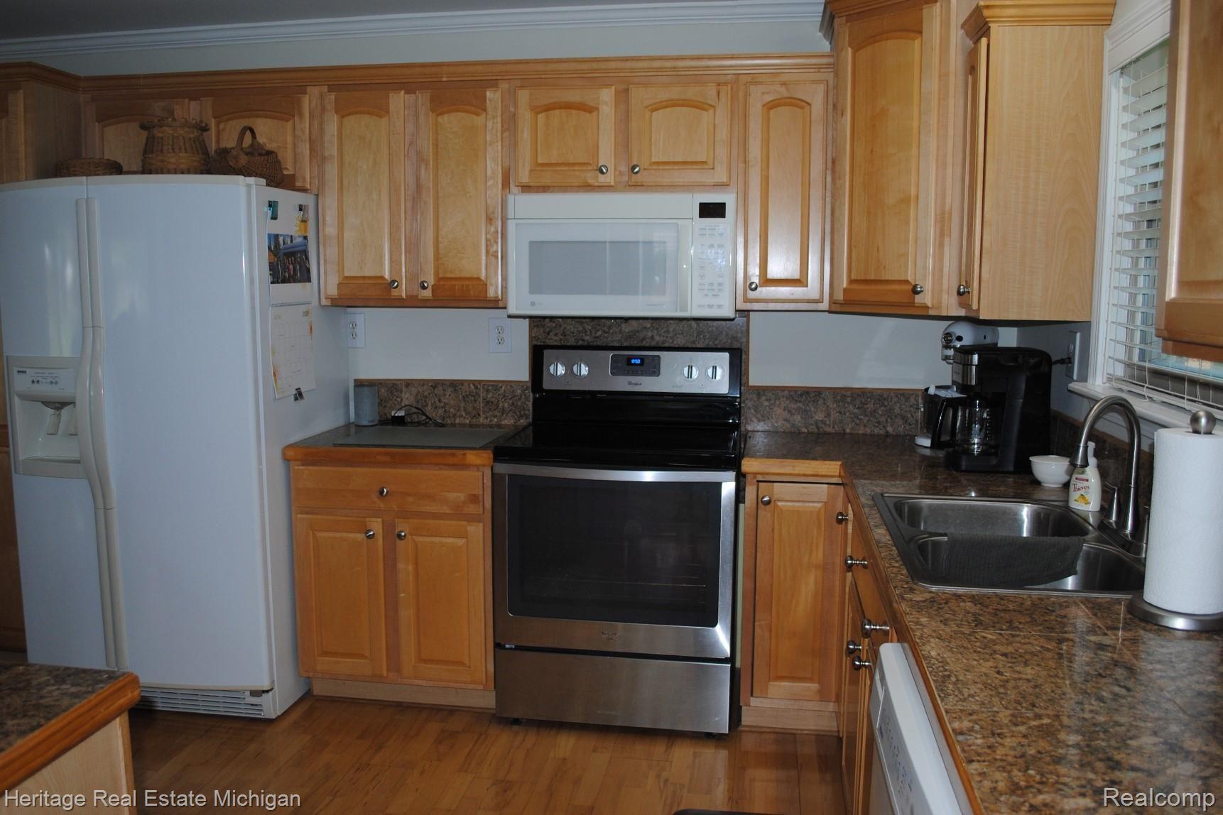 10240 Buno Road Brighton, MI 48114 - Photo 4 of 20 The well-appointed kitchen includes all the appliances!