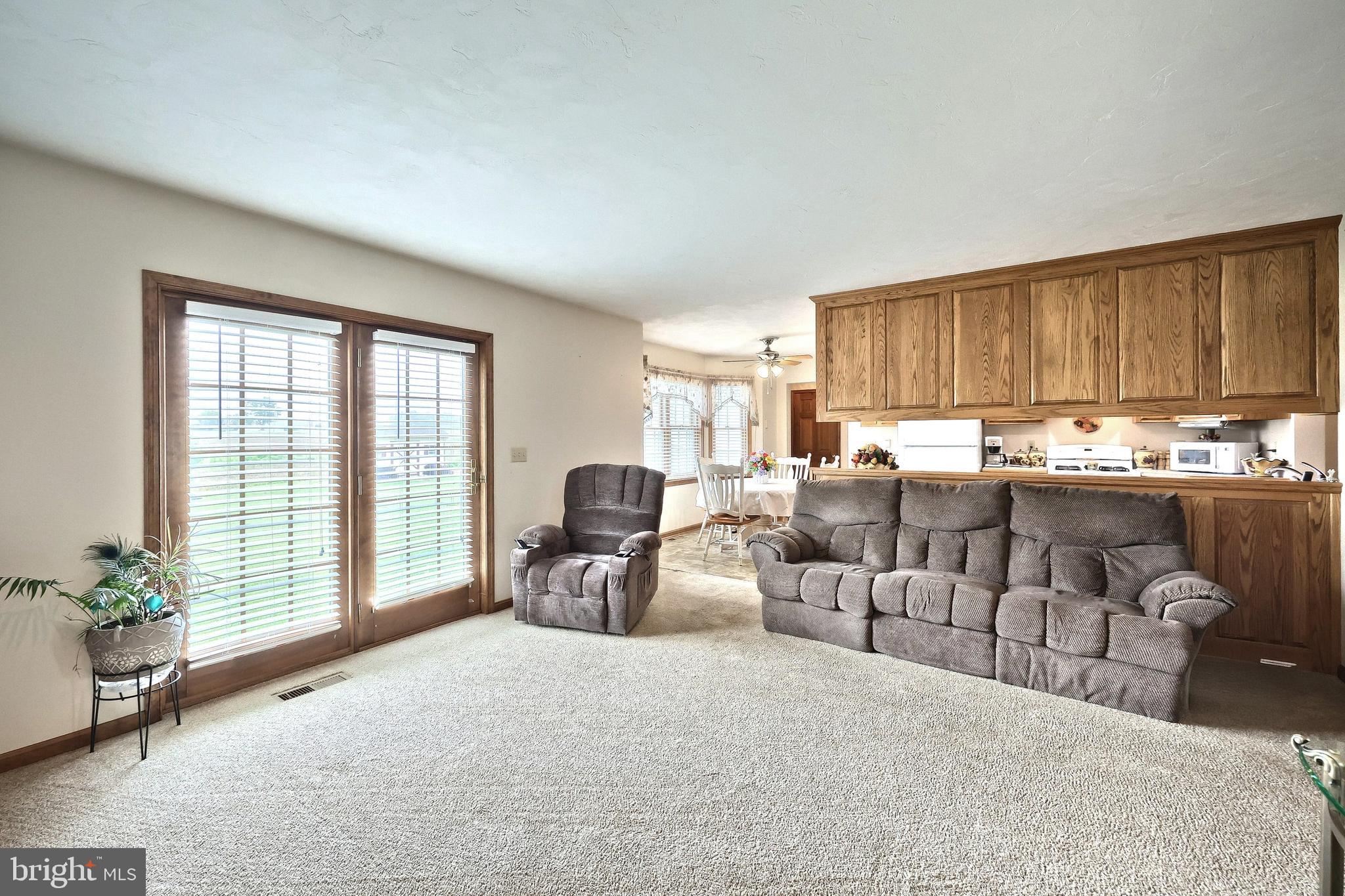 574 Mathias Road Littlestown, PA 17340 - Photo 22 of 65 a living room with furniture and a large window