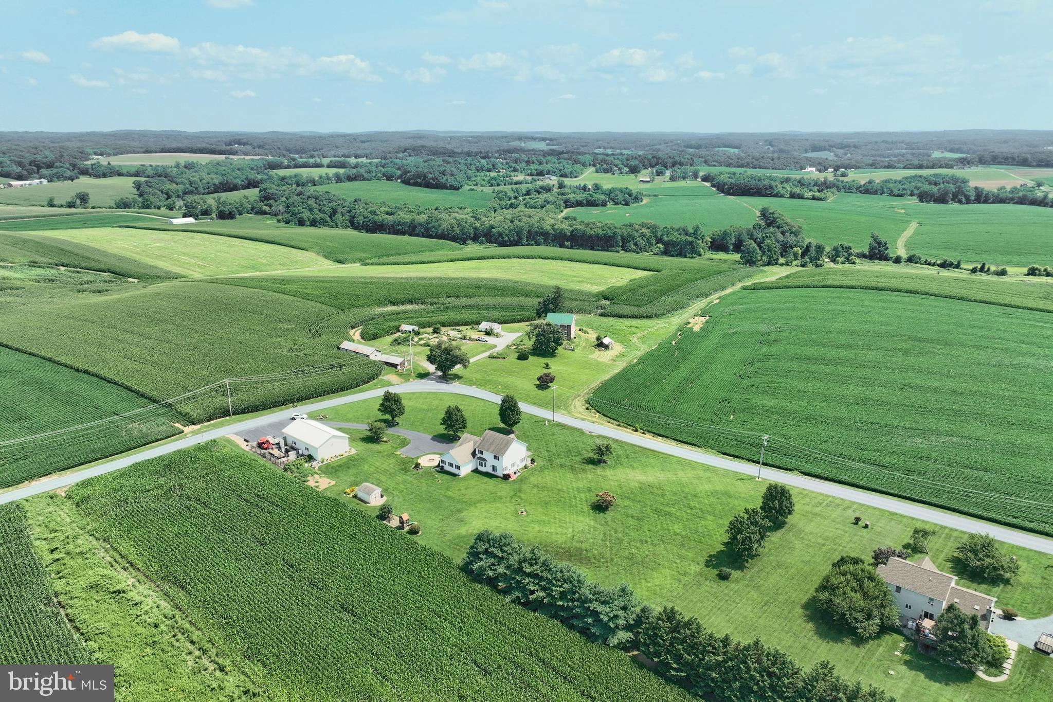 574 Mathias Road Littlestown, PA 17340 - Photo 52 of 65 a view of a golf course with a lake