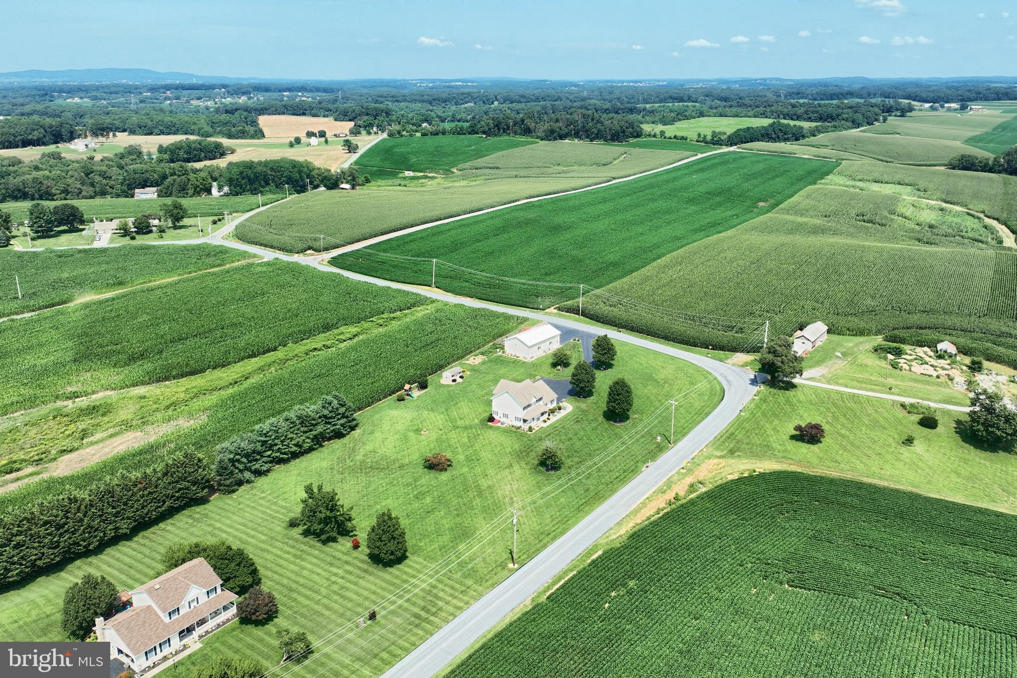 574 Mathias Road Littlestown, PA 17340 - Photo 53 of 65 an aerial view of a golf course with parking