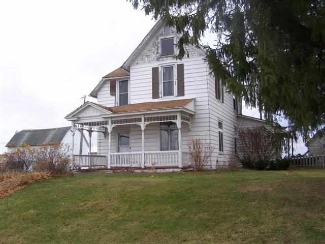 8513 South Massbach Road Elizabeth, IL 61028 - Photo 1 of 10 a view of a house with a garden