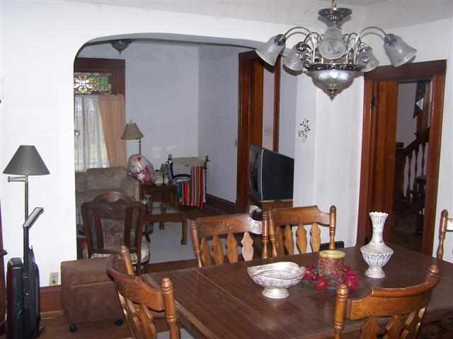 8513 South Massbach Road Elizabeth, IL 61028 - Photo 4 of 10 a view of a dining room with furniture and wooden floor