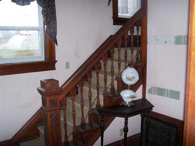 8513 South Massbach Road Elizabeth, IL 61028 - Photo 5 of 10 a view of entryway and hall with wooden floor