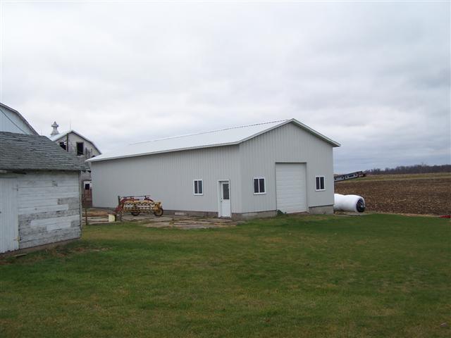 8513 South Massbach Road Elizabeth, IL 61028 - Photo 10 of 10 a house with garden in front of it