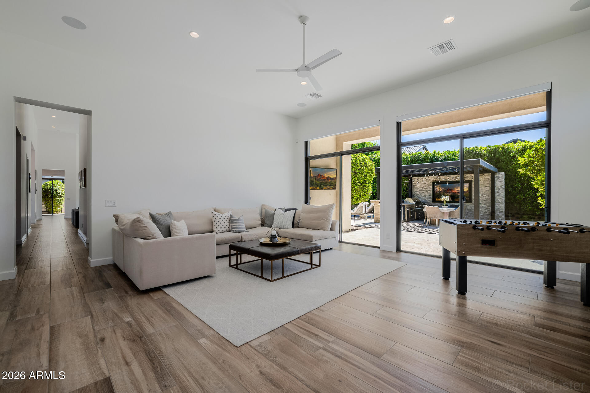 2665 East Hummingbird Way Gilbert, AZ 85297 - Photo 37 of 100 a living room with furniture and a large window