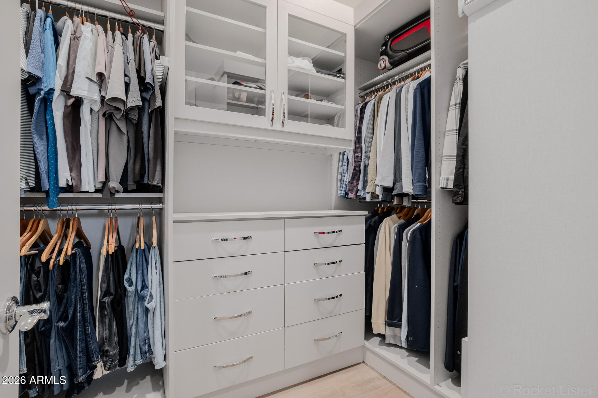 2665 East Hummingbird Way Gilbert, AZ 85297 - Photo 44 of 100 a view of walk in closet with clothes and shoes