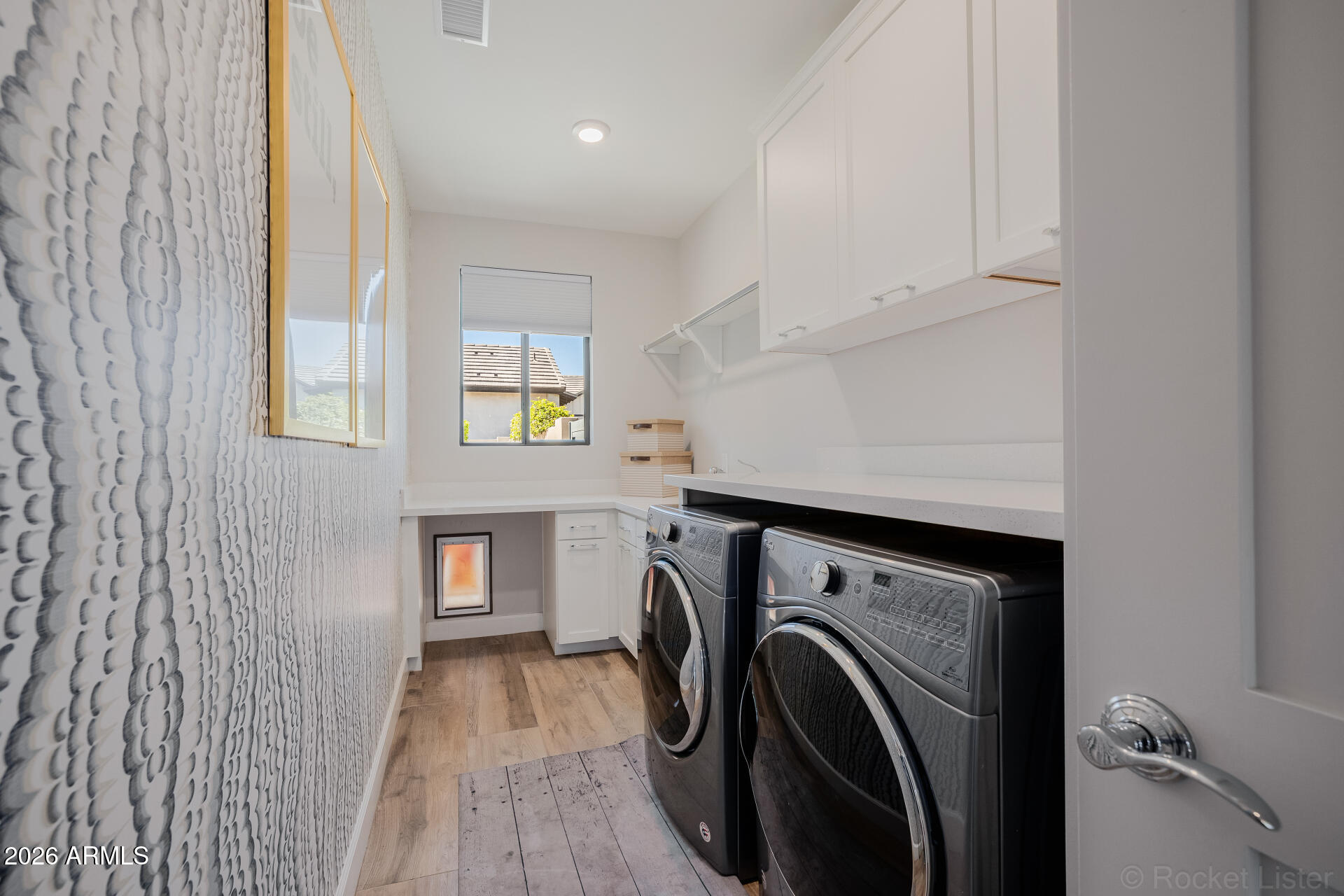 2665 East Hummingbird Way Gilbert, AZ 85297 - Photo 56 of 100 a view of a hallway with washer and dryer