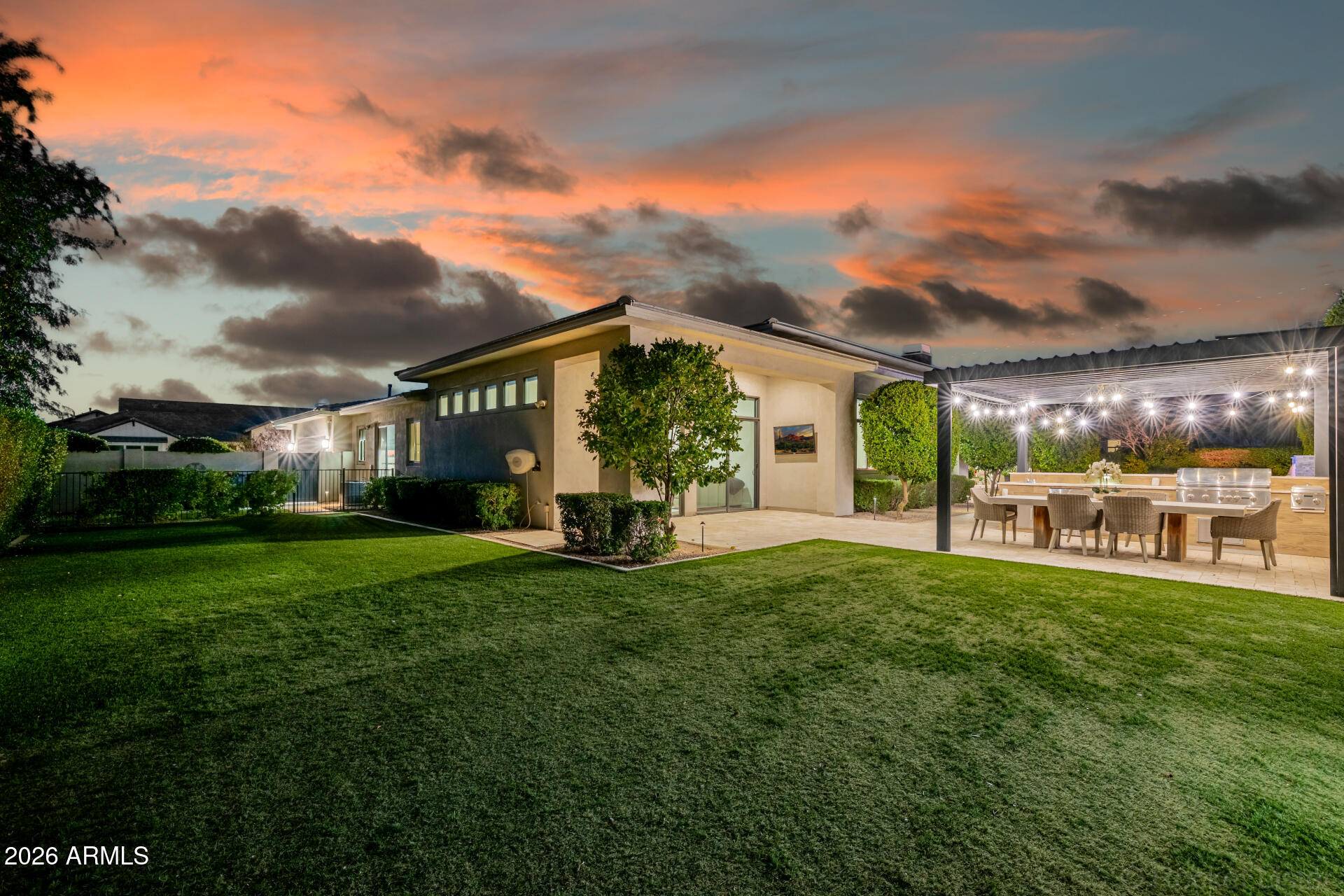2665 East Hummingbird Way Gilbert, AZ 85297 - Photo 68 of 100 a view of a house with a big yard and large tree