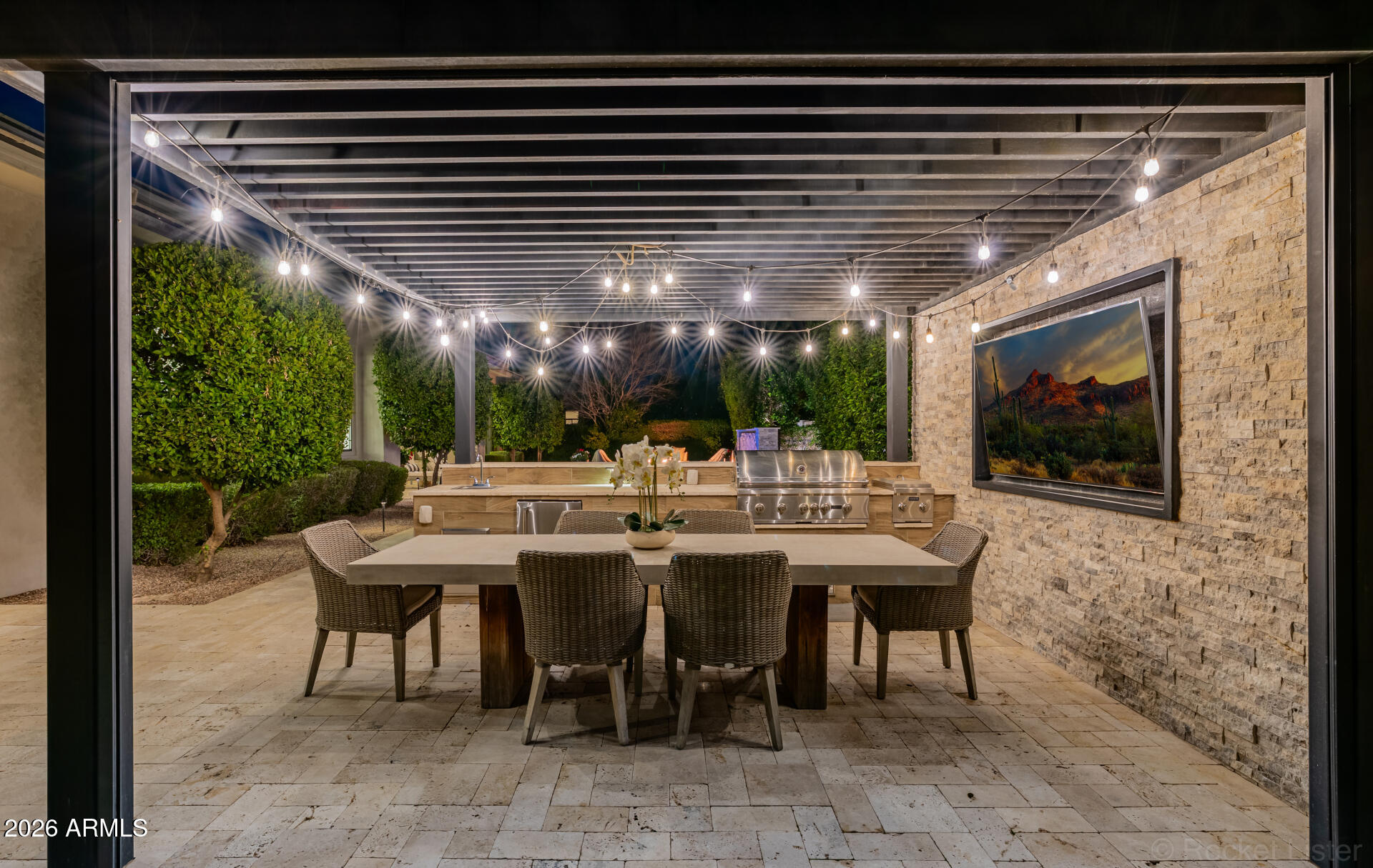 2665 East Hummingbird Way Gilbert, AZ 85297 - Photo 69 of 100 a view of a patio with a table and chairs under an umbrella