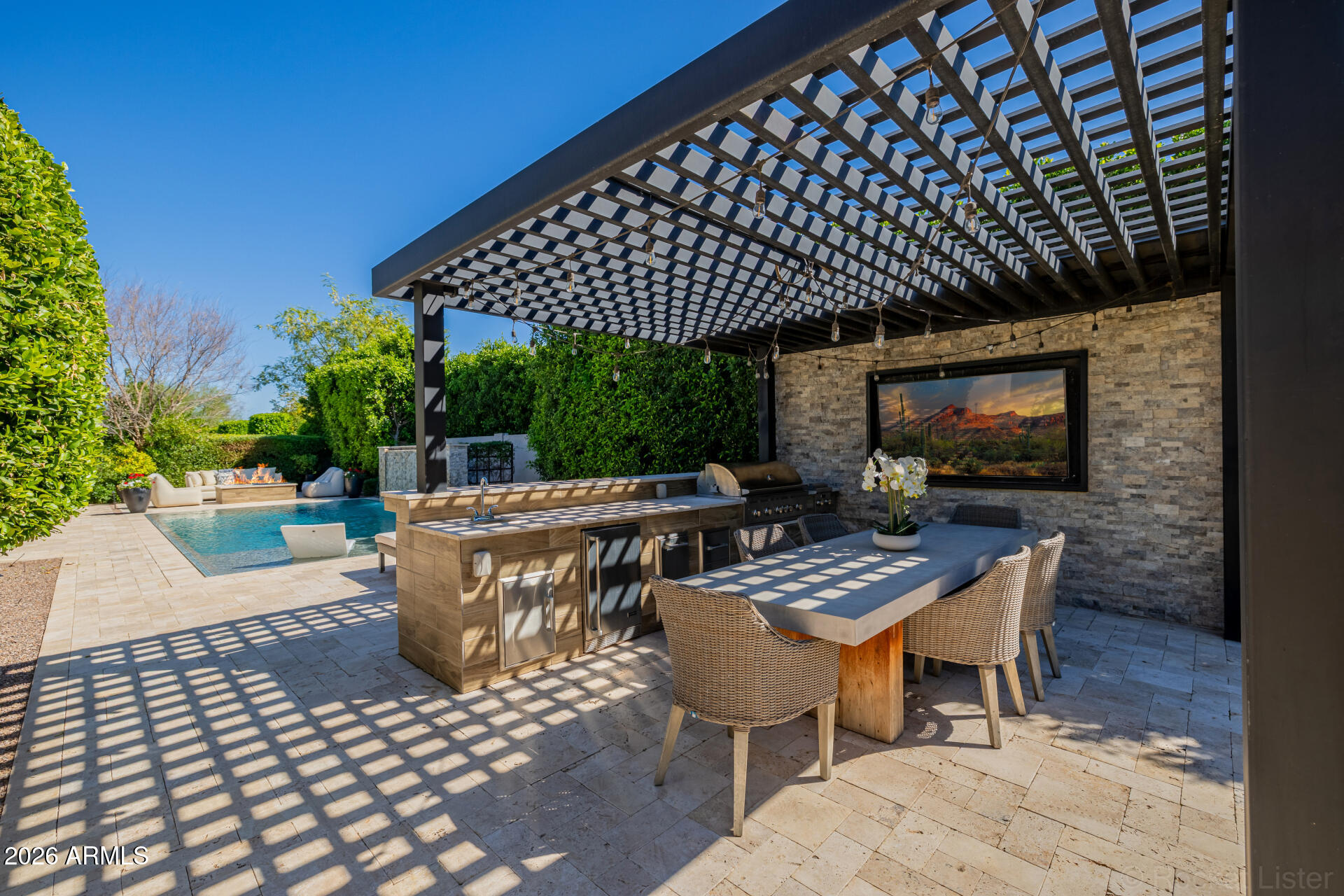 2665 East Hummingbird Way Gilbert, AZ 85297 - Photo 72 of 100 a view of a patio with a table and chairs