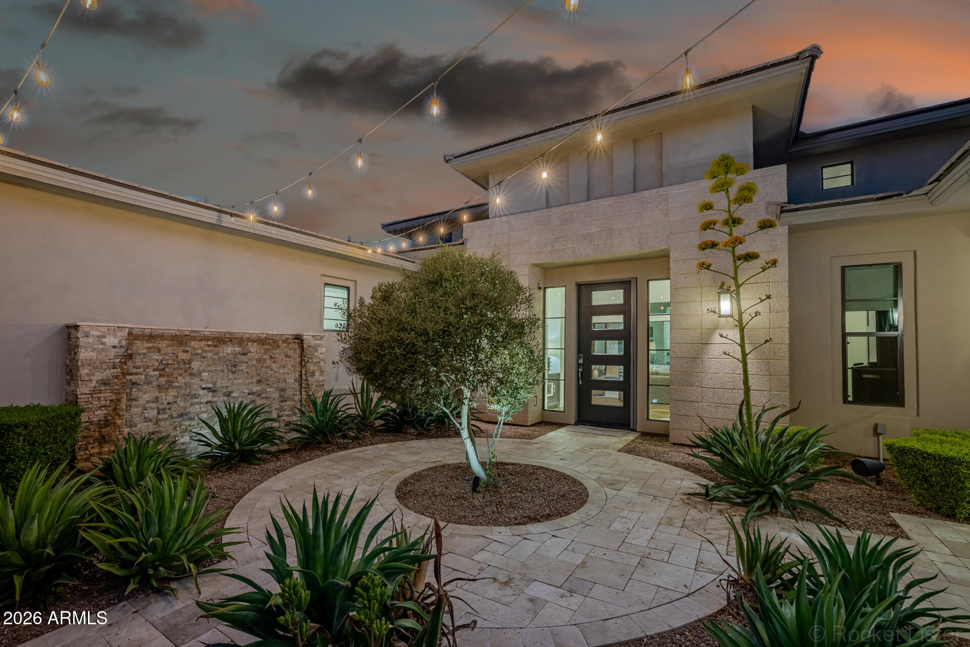 2665 East Hummingbird Way Gilbert, AZ 85297 - Photo 9 of 100 a front view of a house with a yard