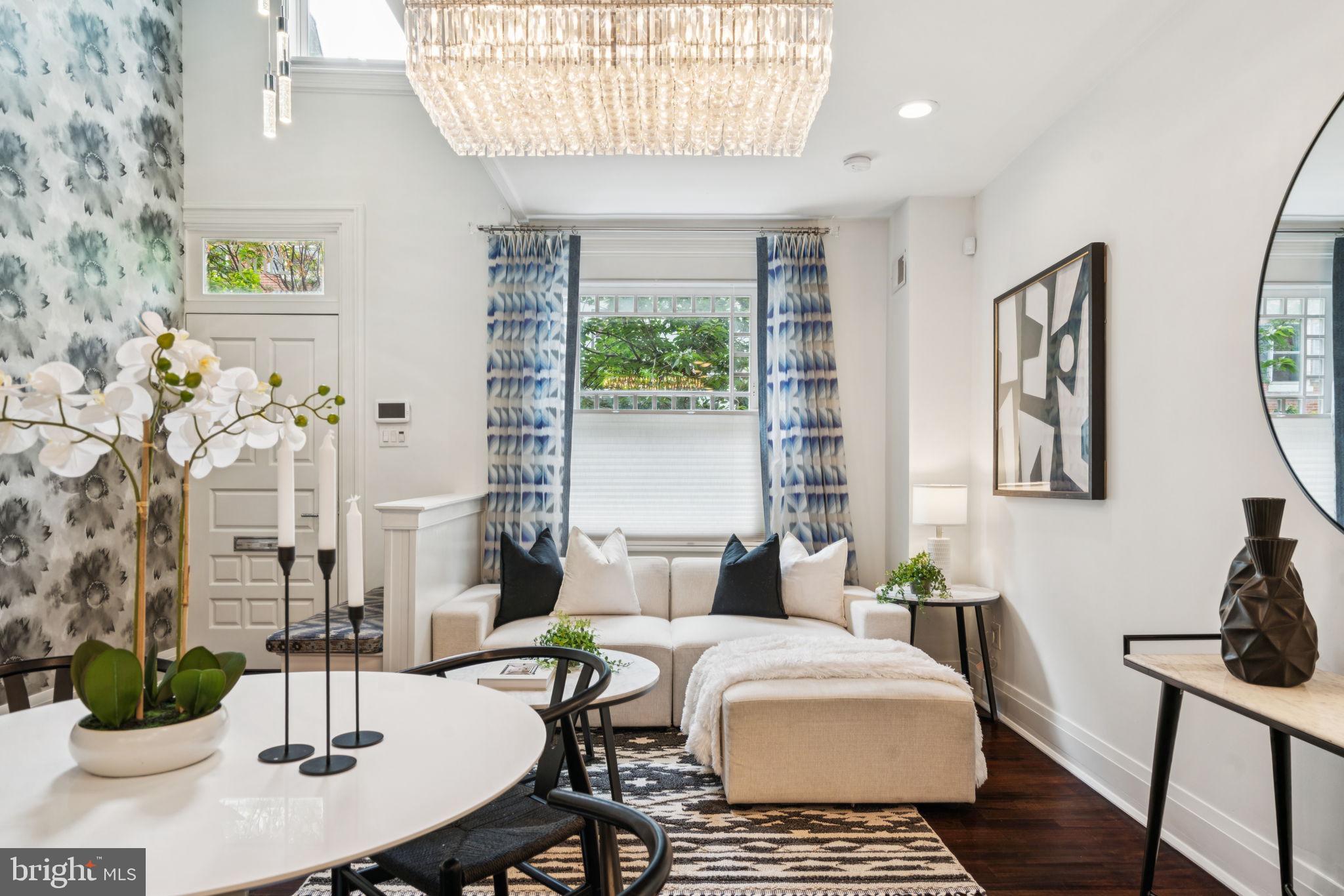 a living room with furniture and a table