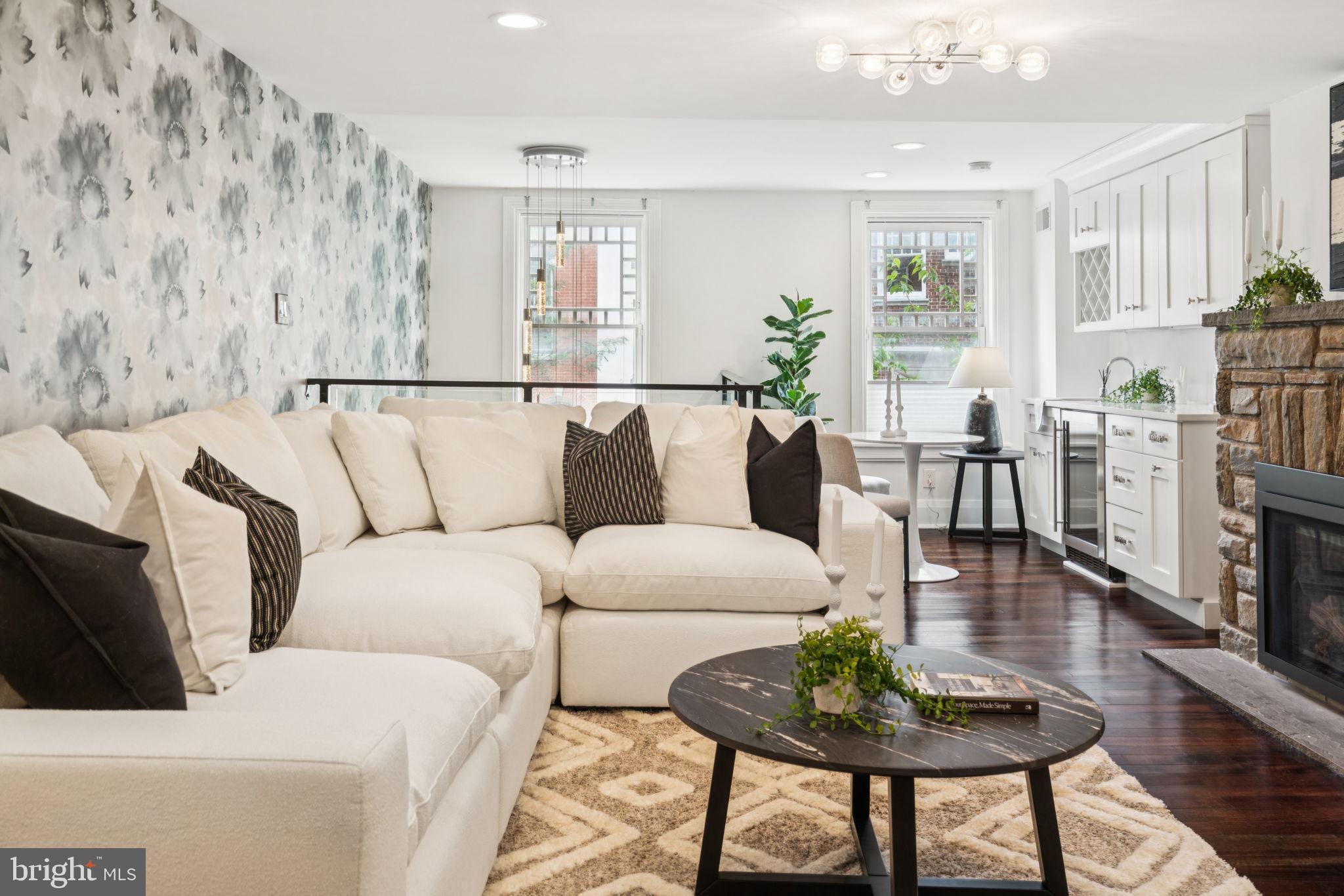 2109 Locust Street Philadelphia, PA 19103 - Photo 11 of 38 a living room with furniture and a wooden floor