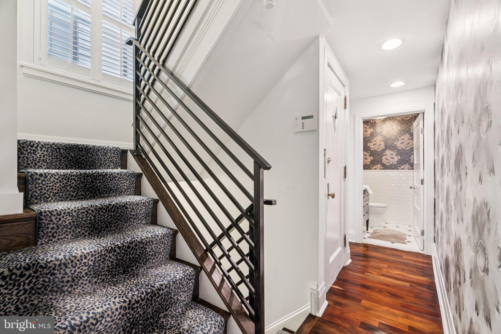 2109 Locust Street Philadelphia, PA 19103 - Photo 13 of 38 a view of a hallway with wooden floor and entryway